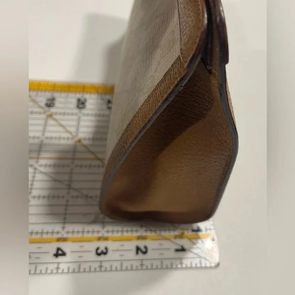 Gucci pvc/leather clutch